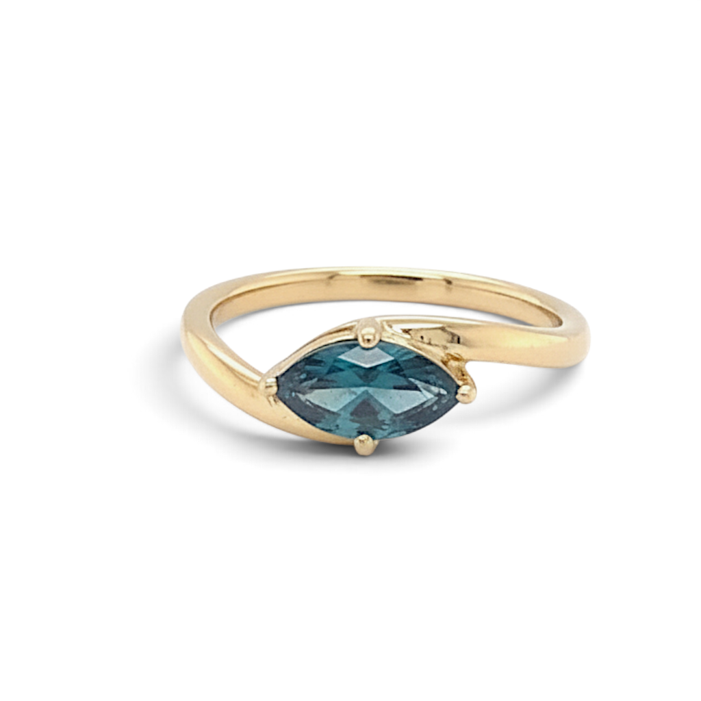Caribbean Gems solitaire ring featuring a 0.70ct marquise-cut blue diamond set in 14kt yellow gold