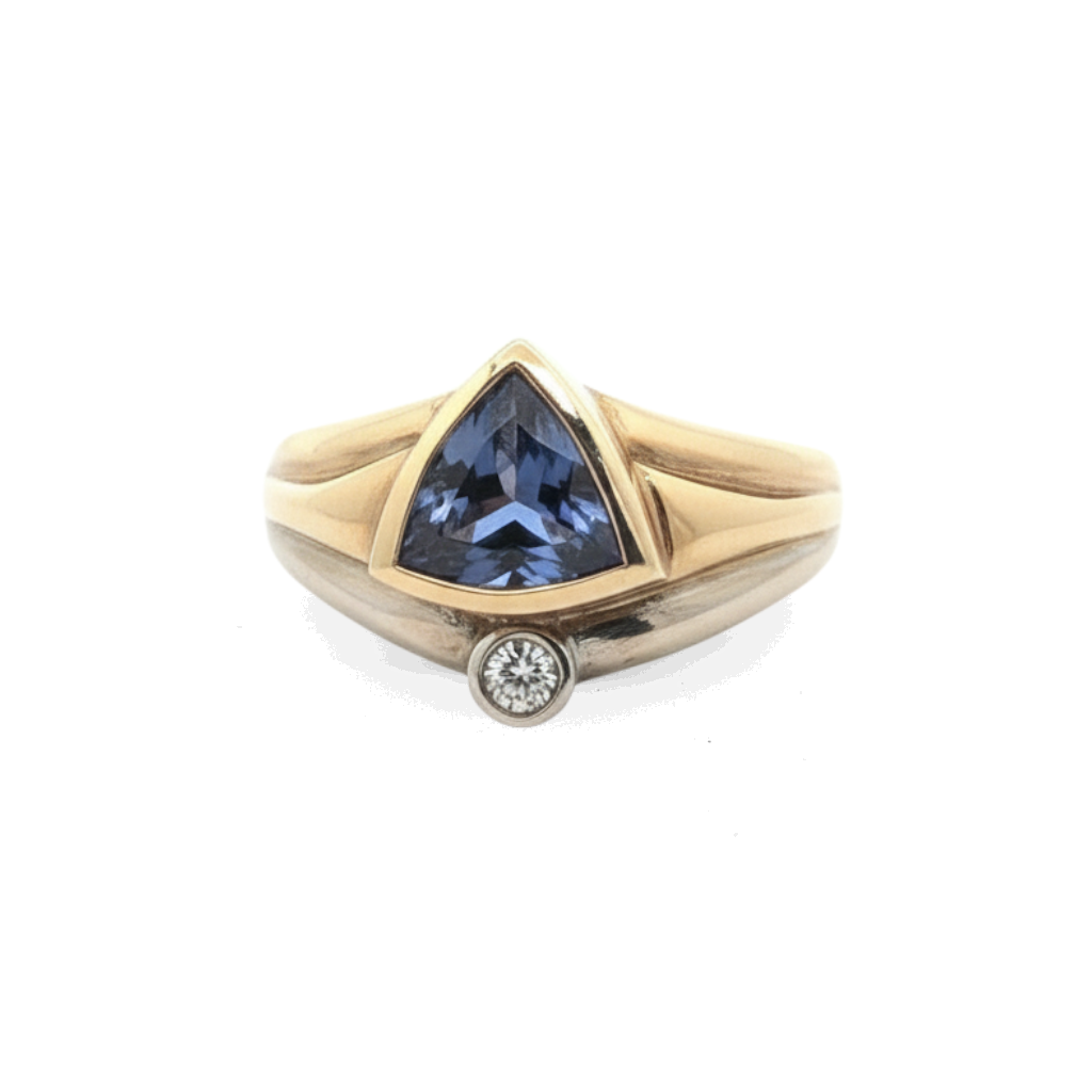 Caribbean Gems trillion-cut tanzanite and diamond ring in 14kt two-tone gold with a blue-violet gemstone centerpiece.