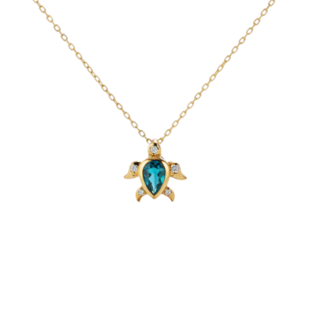 Caribbean Gems turtle pendant in 14kt yellow gold with a pear-shaped London blue topaz and sparkling diamond accents.