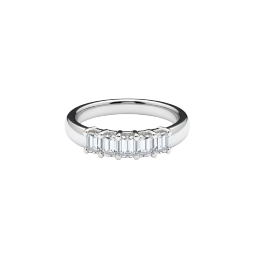 Caribbean Gems 18kt white gold band featuring a row of elegant emerald cut diamonds in a polished setting.