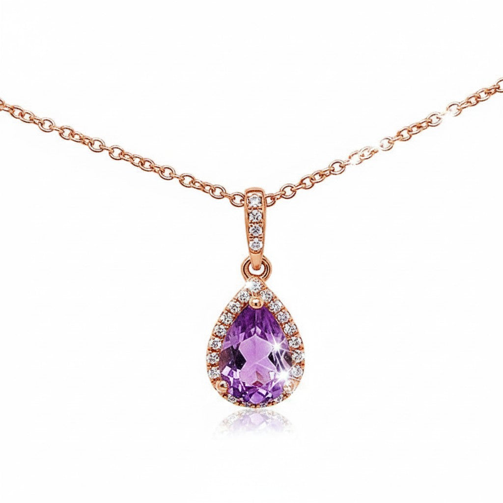 Caribbean Gems pear-shaped amethyst pendant with diamond halo in 14kt rose gold on a delicate chain.