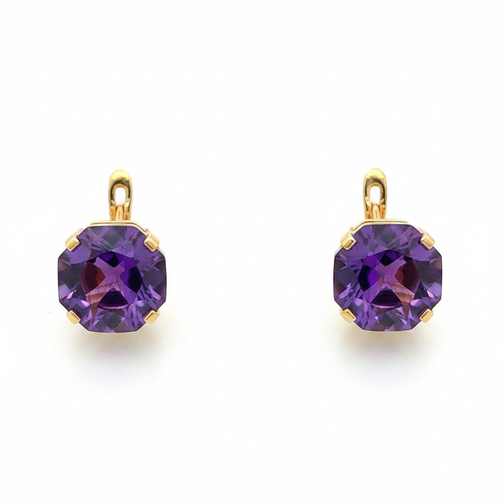 Caribbean Gems amethyst earrings featuring faceted purple gemstones set in 14kt yellow gold on a white background.