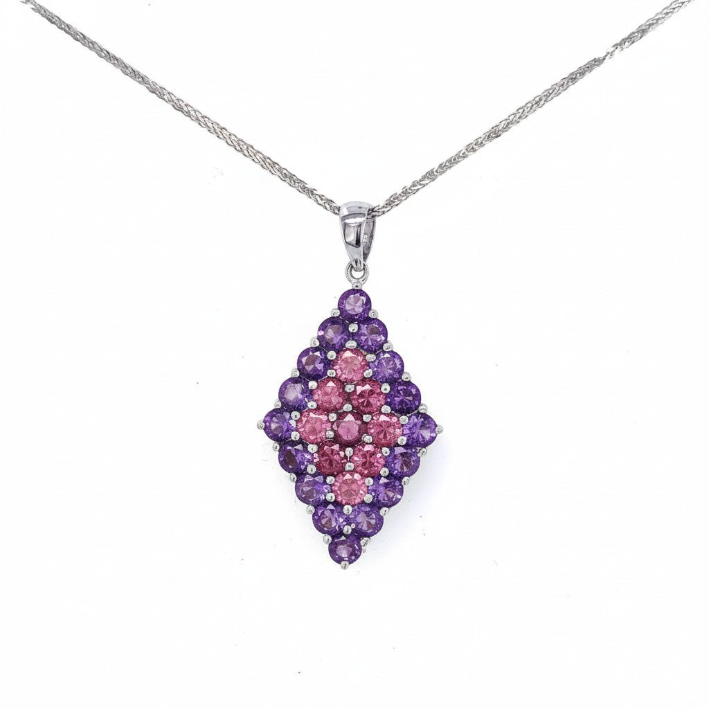 Caribbean Gems diamond-shaped pendant featuring round amethyst and pink tourmaline stones set in sterling silver