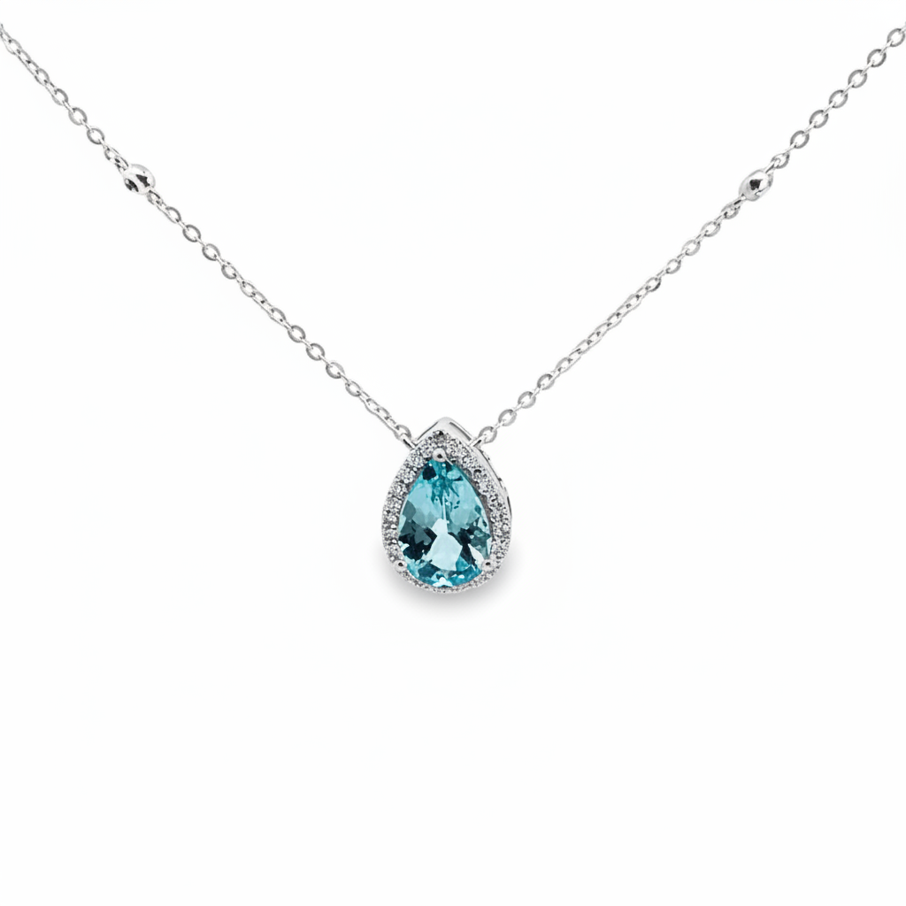 Caribbean Gems pear-shaped aquamarine pendant with diamond halo in 14kt white gold on a delicate chain
