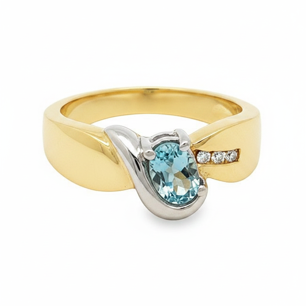 Caribbean Gems two-tone 14kt gold ring featuring an oval aquamarine stone and three accent diamonds.