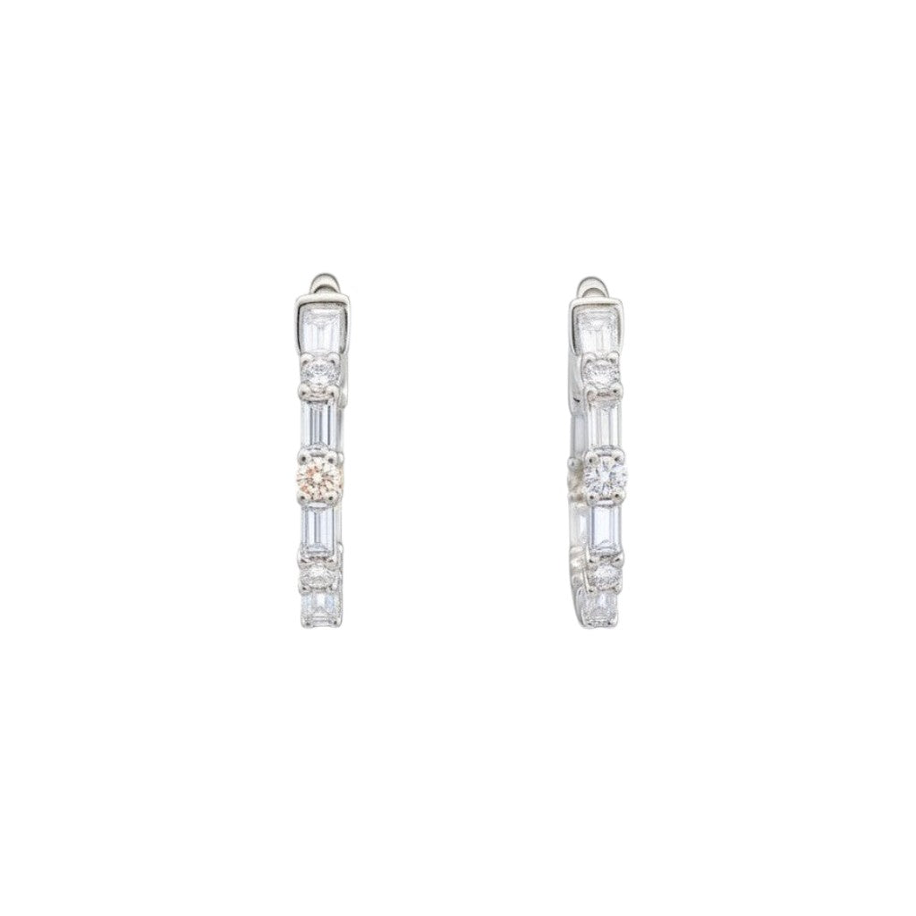 Caribbean Gems 14kt white gold hoop earrings featuring alternating round and baguette cut diamonds.