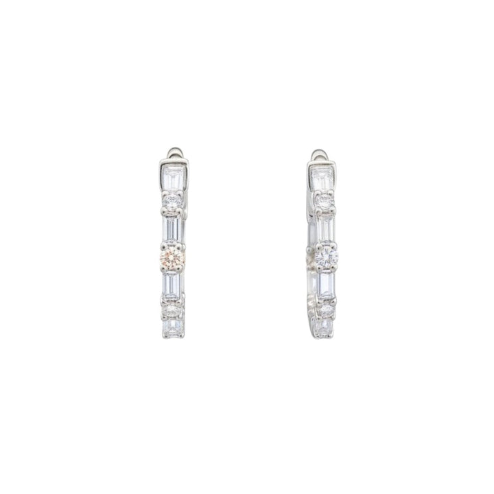 Caribbean Gems 14kt white gold hoop earrings featuring alternating round and baguette cut diamonds.