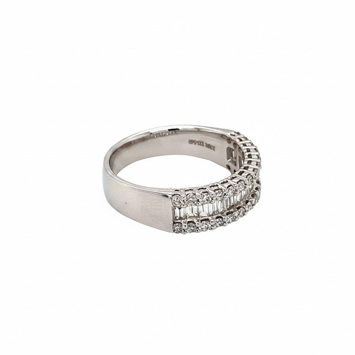 Caribbean Gems 14kt white gold diamond band featuring baguette and round cut diamonds in a layered design.