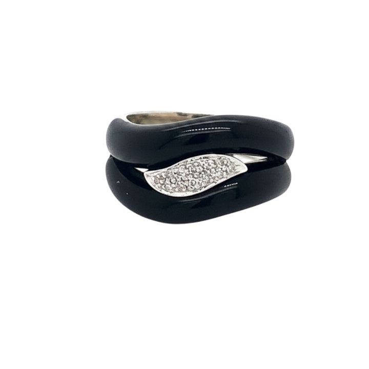 Caribbean Gems black onyx ring featuring a curved design with a sparkling diamond-encrusted accent on a white background