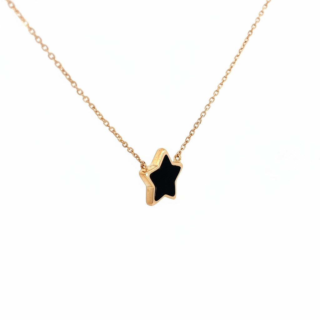 Caribbean Gems black onyx star pendant set in 14kt yellow gold on a delicate matching chain