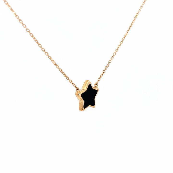 Caribbean Gems black onyx star pendant set in 14kt yellow gold on a delicate matching chain
