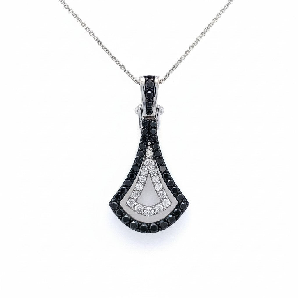 Caribbean Gems 14kt white gold pendant featuring a black diamond center surrounded by sparkling white diamonds.