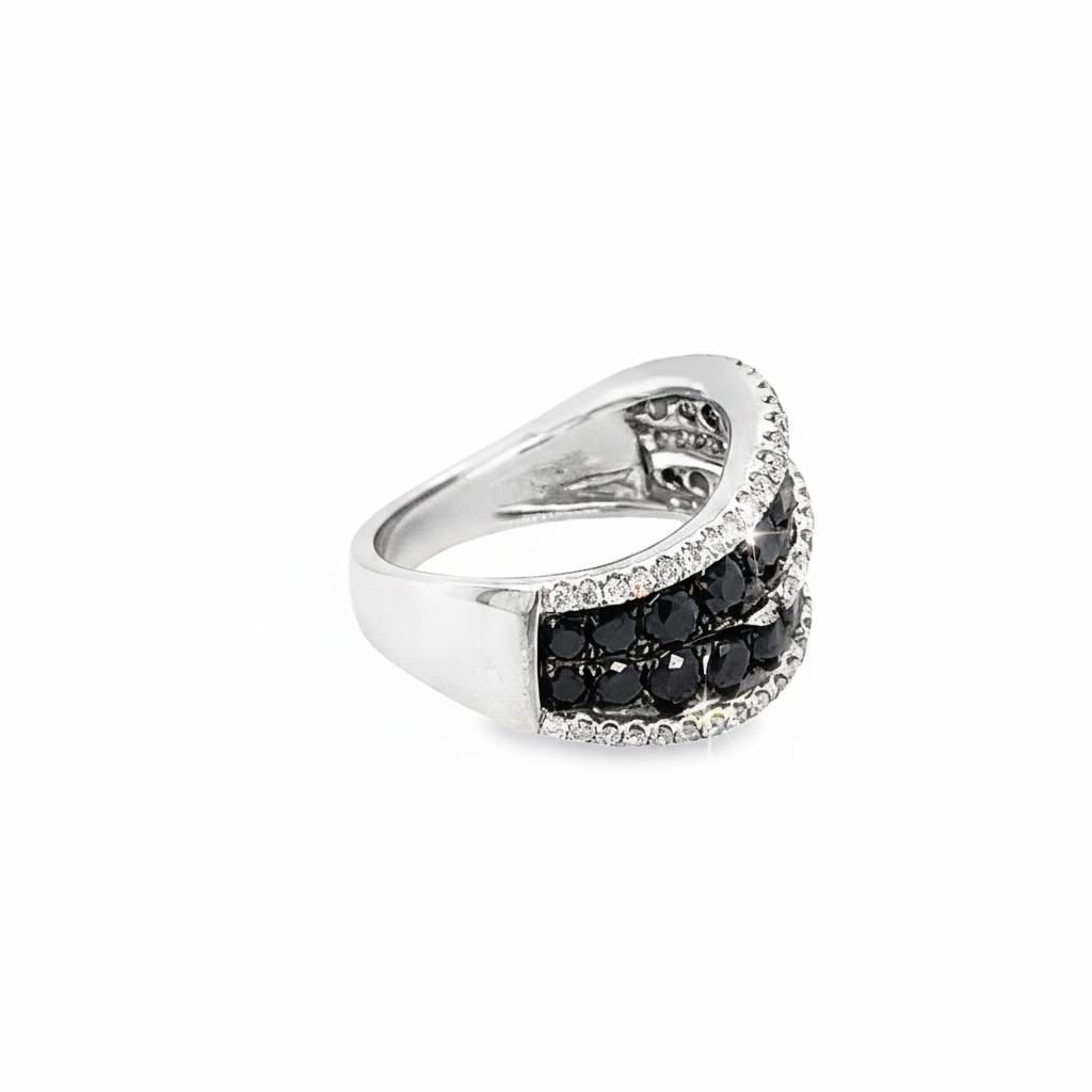 Caribbean Gems elegant 14kt white gold eternity band featuring black and white diamonds in a sophisticated design.
