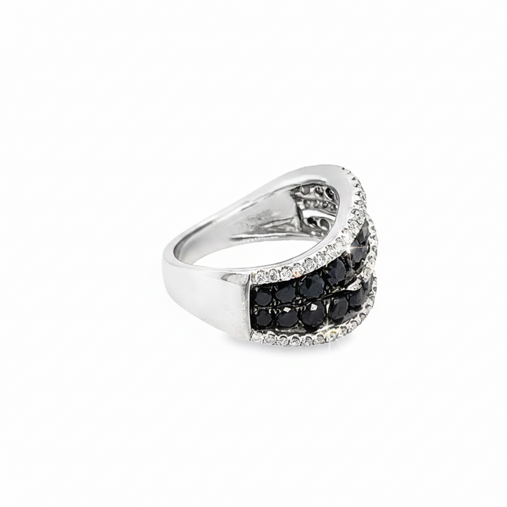 Caribbean Gems elegant 14kt white gold eternity band featuring black and white diamonds in a sophisticated design.
