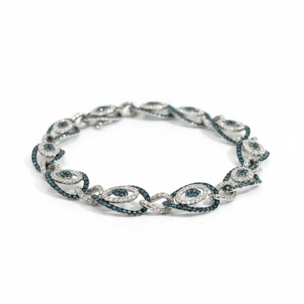 Caribbean Gems 14kt white gold bracelet with a 2.42ct blue diamond and 1.77ct accent diamonds in an elegant link design
