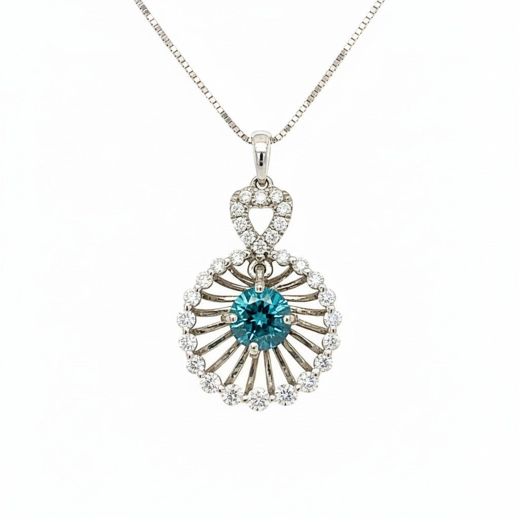 Caribbean Gems 14kt white gold pendant with a 0.70ct blue diamond and 0.45ct white diamond halo on a silver chain.