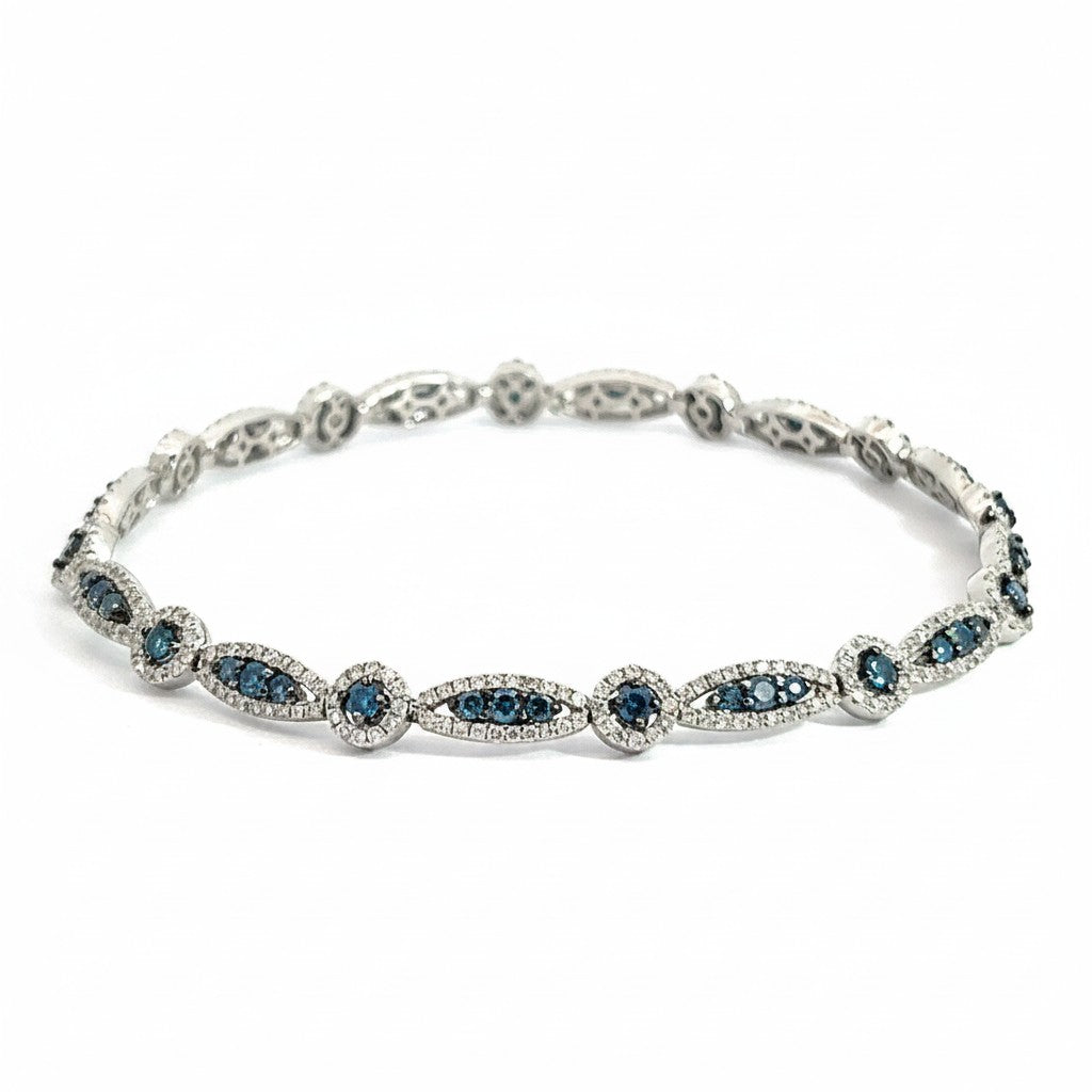 Caribbean Gems 14k gold bracelet featuring alternating marquise and round blue and white diamond settings.