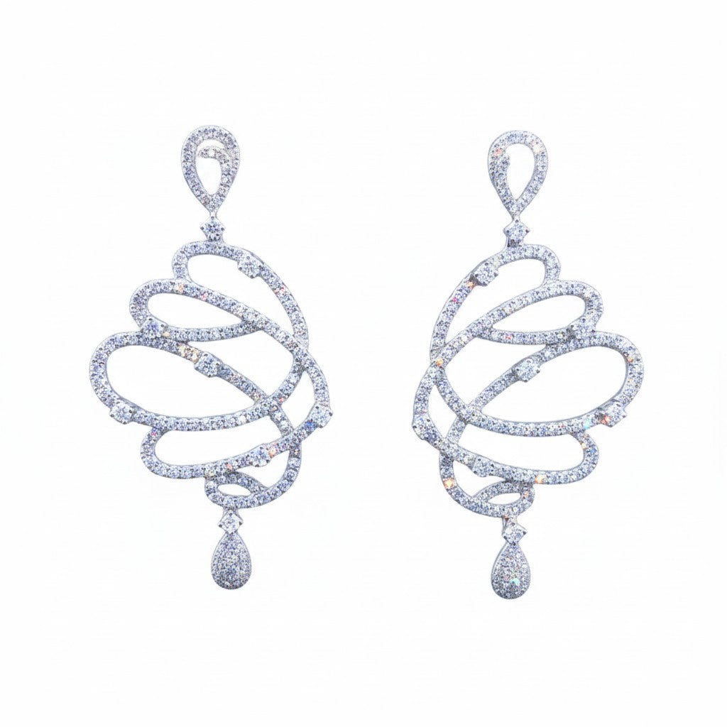 Caribbean Gems butterfly wing earrings in 14kt white gold with 2.50cts of round brilliant cut diamonds.