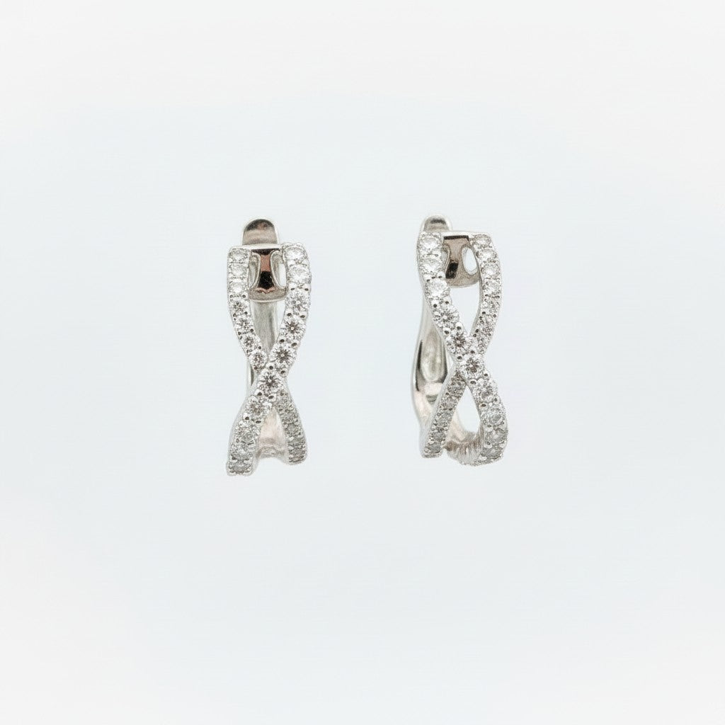 Caribbean Gems 14k gold drop earrings featuring a unique criss-cross design encrusted with 1.28 carats of diamonds.