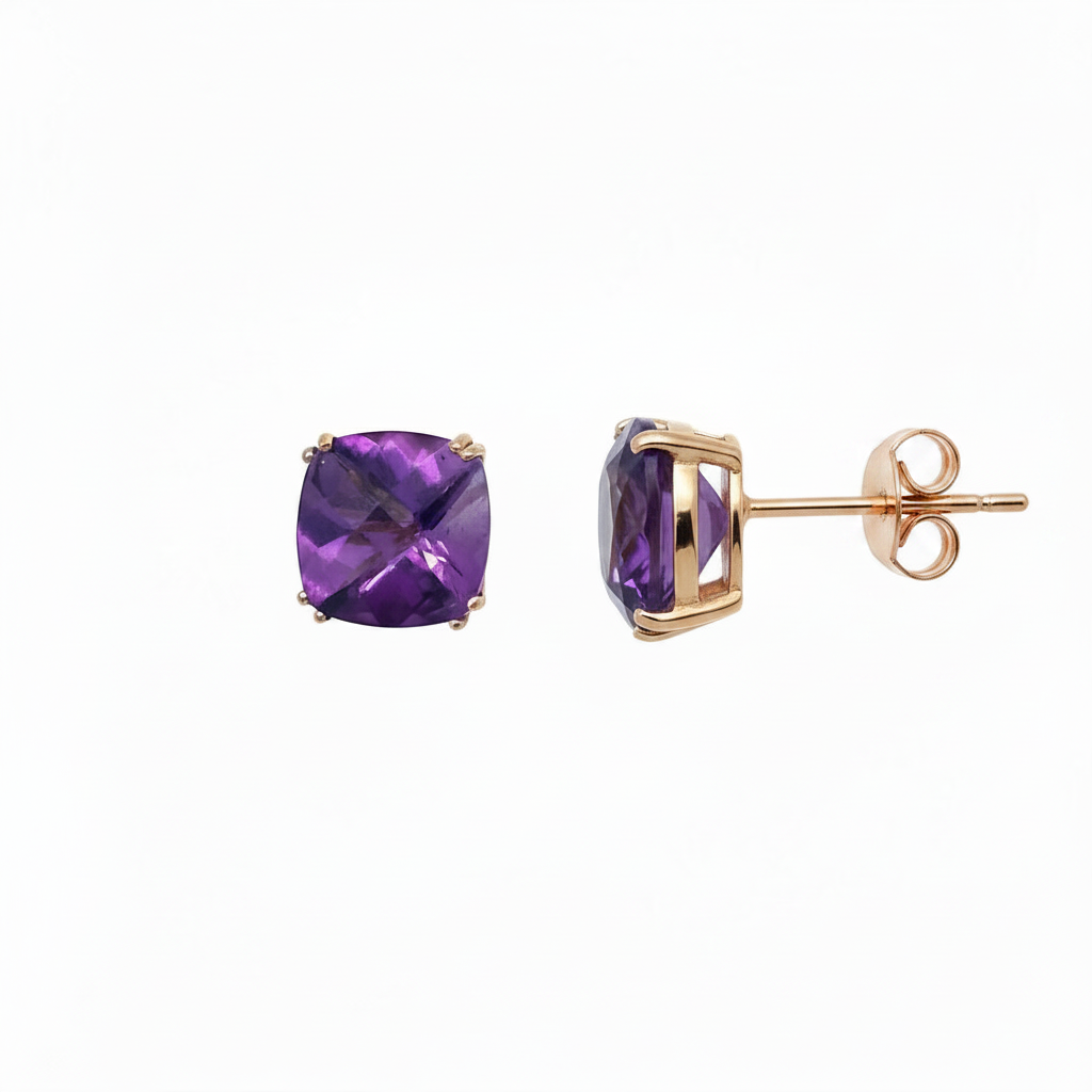 Caribbean Gems 14kt yellow gold stud earrings featuring cushion cut amethyst stones on a white background.