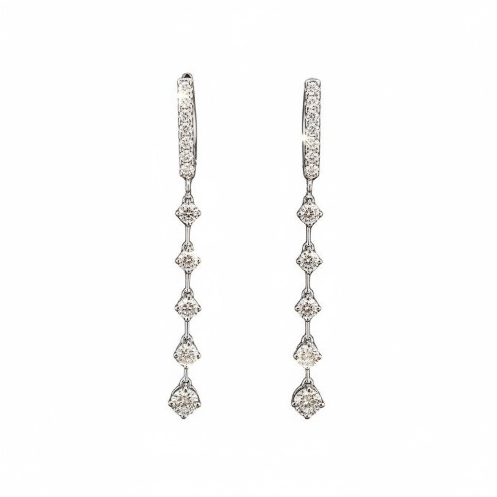 Caribbean Gems dangling diamond earrings featuring 1.22cts of round diamonds set in 14kt white gold