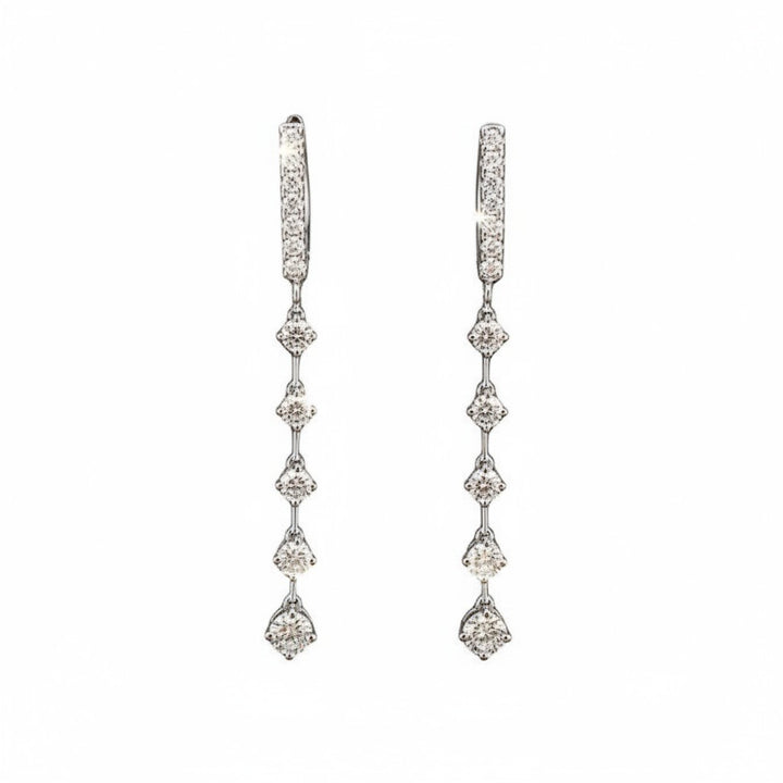 Caribbean Gems dangling diamond earrings featuring 1.22cts of round diamonds set in 14kt white gold