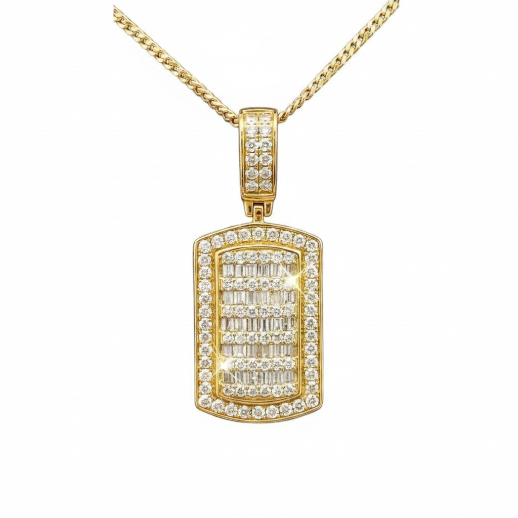 Caribbean Gems 14kt yellow gold dog tag pendant featuring round and baguette cut diamonds on a gold chain.