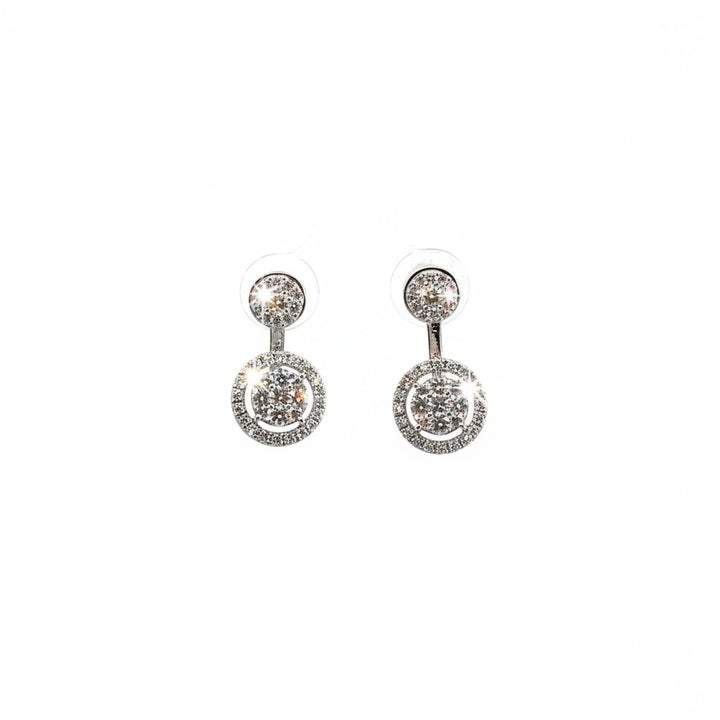 Caribbean Gems 18kt white gold drop earrings featuring 1.07cts tw round diamonds in a circular halo design.