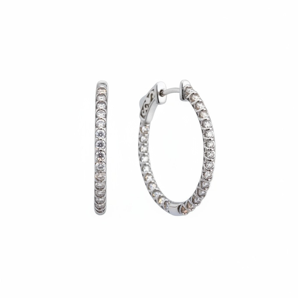 Caribbean Gems 14kt white gold inside-out hoop earrings with 1.50 carats of sparkling round diamonds.