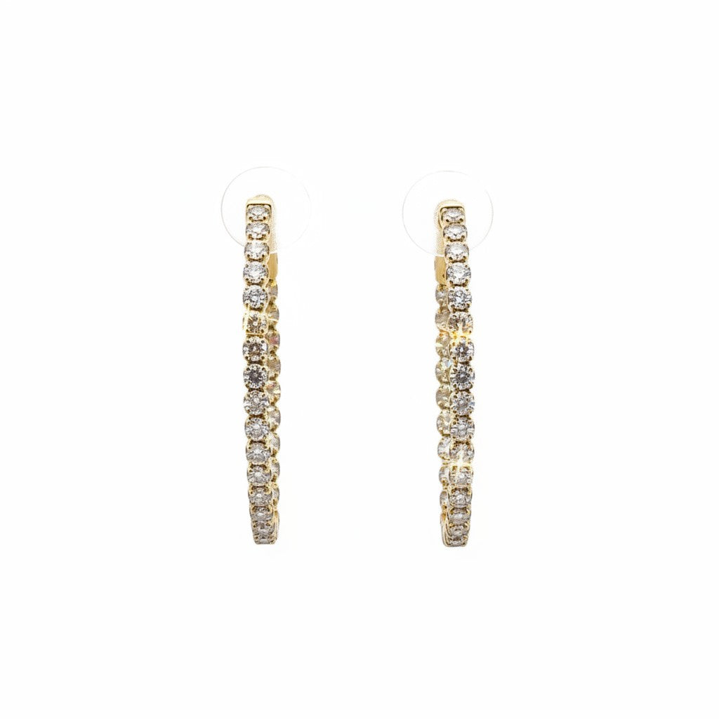 Caribbean Gems 14k yellow gold inside-out hoop earrings featuring nearly 2 carats of sparkling round diamonds.
