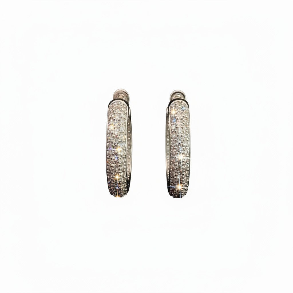 Caribbean Gems elegant hoop earrings featuring 3.75 carats of sparkling pavé diamonds in a polished silver setting.