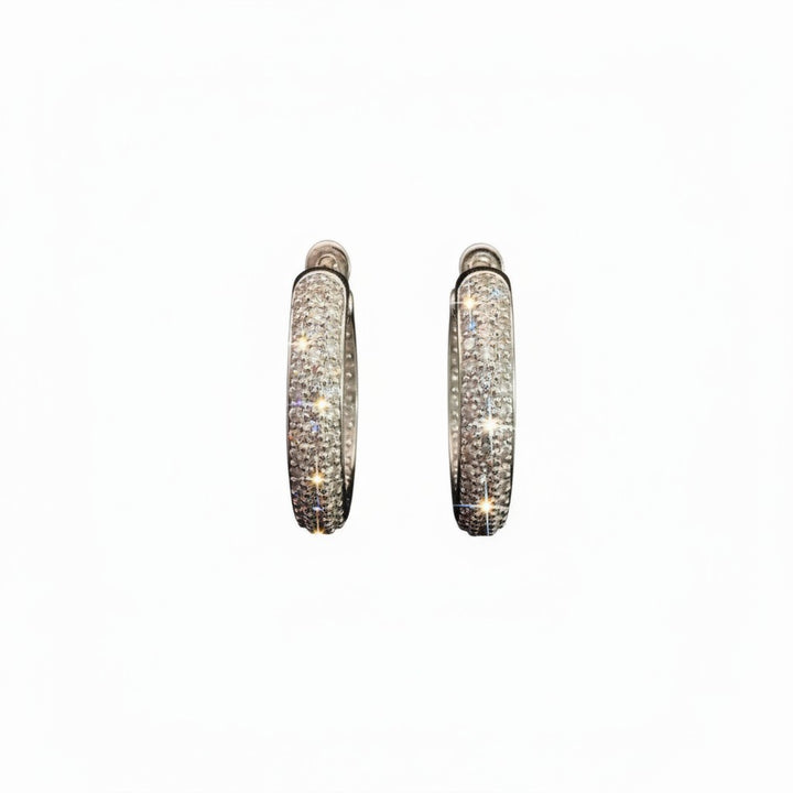 Caribbean Gems elegant hoop earrings featuring 3.75 carats of sparkling pavé diamonds in a polished silver setting.