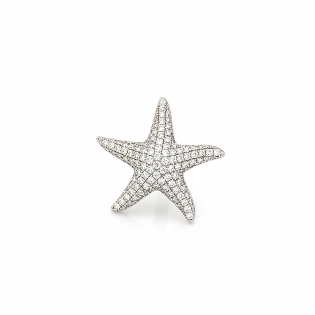 Caribbean Gems 14kt white gold starfish pendant encrusted with 0.51ct round brilliant diamonds on a white background.