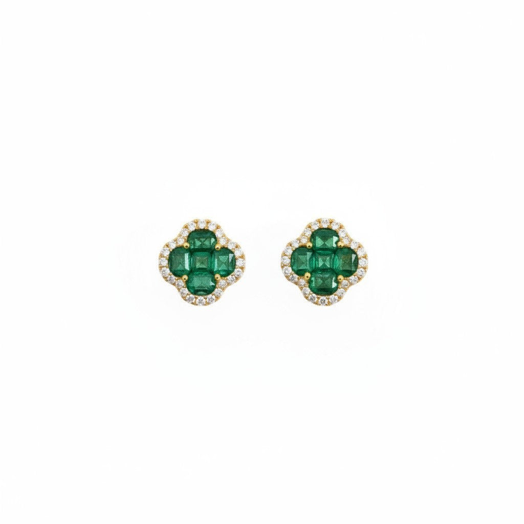 Caribbean Gems 14kt yellow gold clover earrings with round emeralds and diamond halos on a white background.