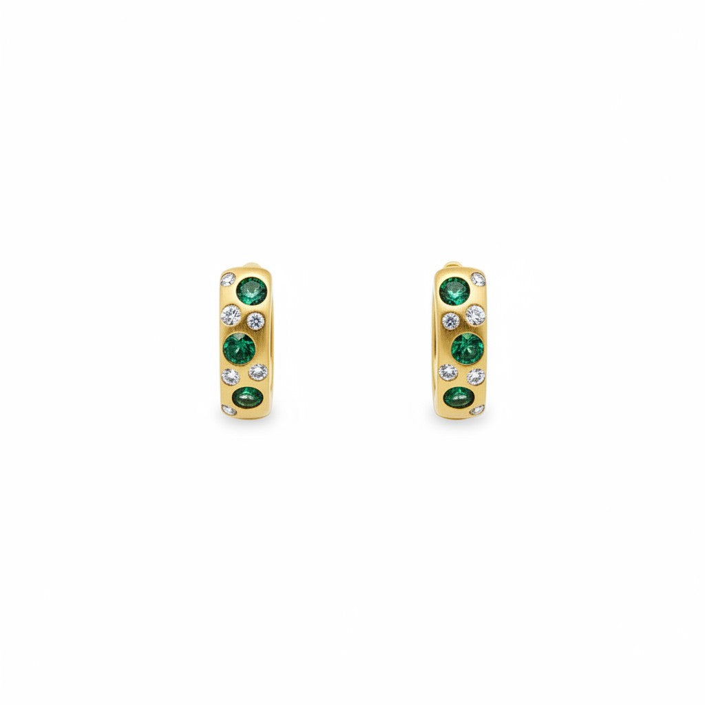 Caribbean Gems 14kt yellow gold hoop earrings featuring round emeralds and sparkling diamond accents.