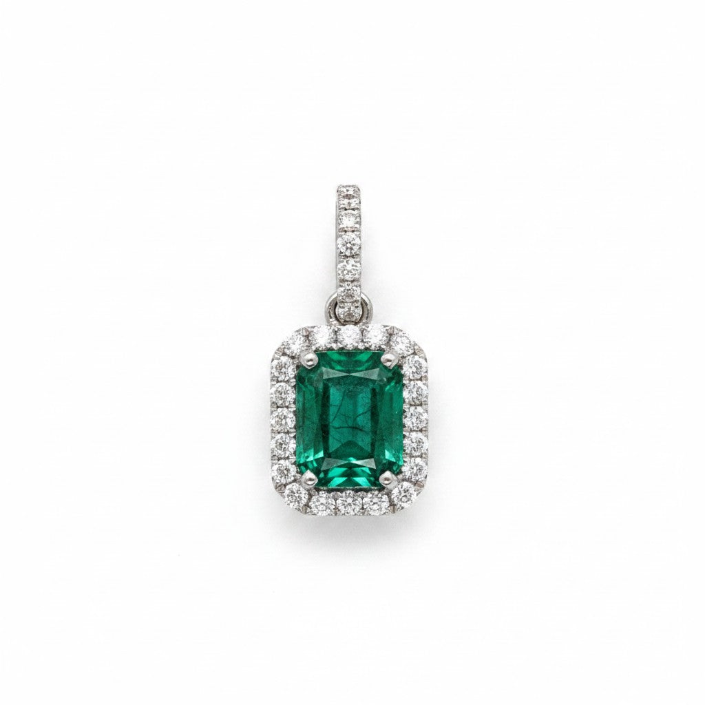 Caribbean Gems emerald-cut emerald pendant with diamond halo in 18kt white gold