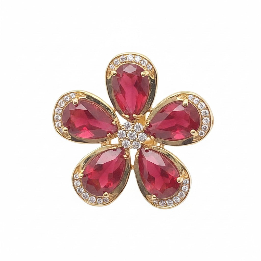 Caribbean Gems floral ring featuring a pear-shaped ruby center and diamond accents set in 14kt yellow gold