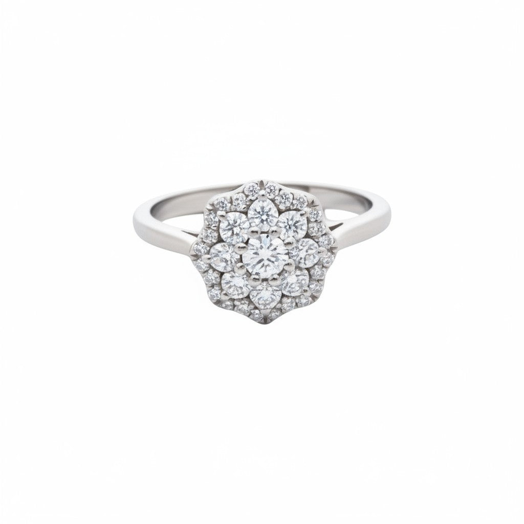 Caribbean Gems 14kt white gold flower-shaped diamond ring with 0.58 carat round diamonds in a cluster setting.