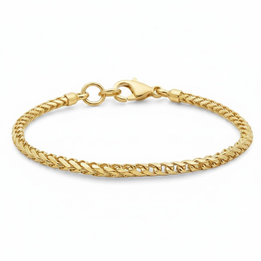 Caribbean Gems 14kt yellow gold Franco link bracelet with a secure lobster claw clasp.