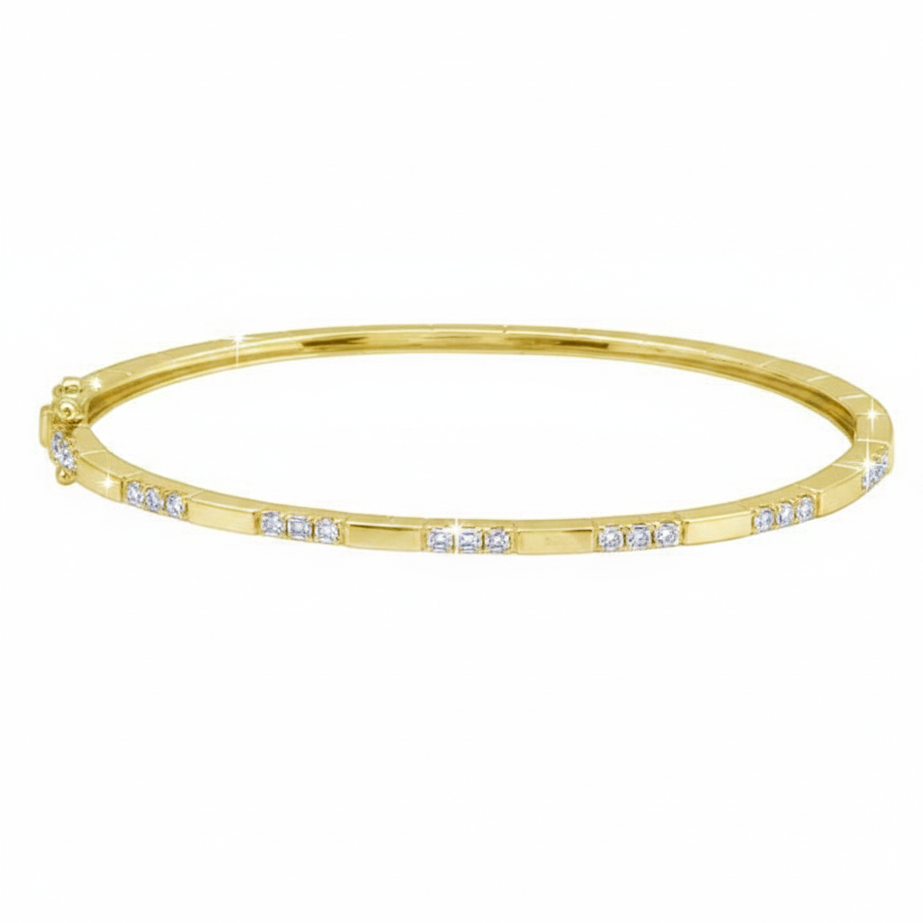 Caribbean Gems 14kt yellow gold bangle with a square pattern and 0.56cts of sparkling round diamonds.