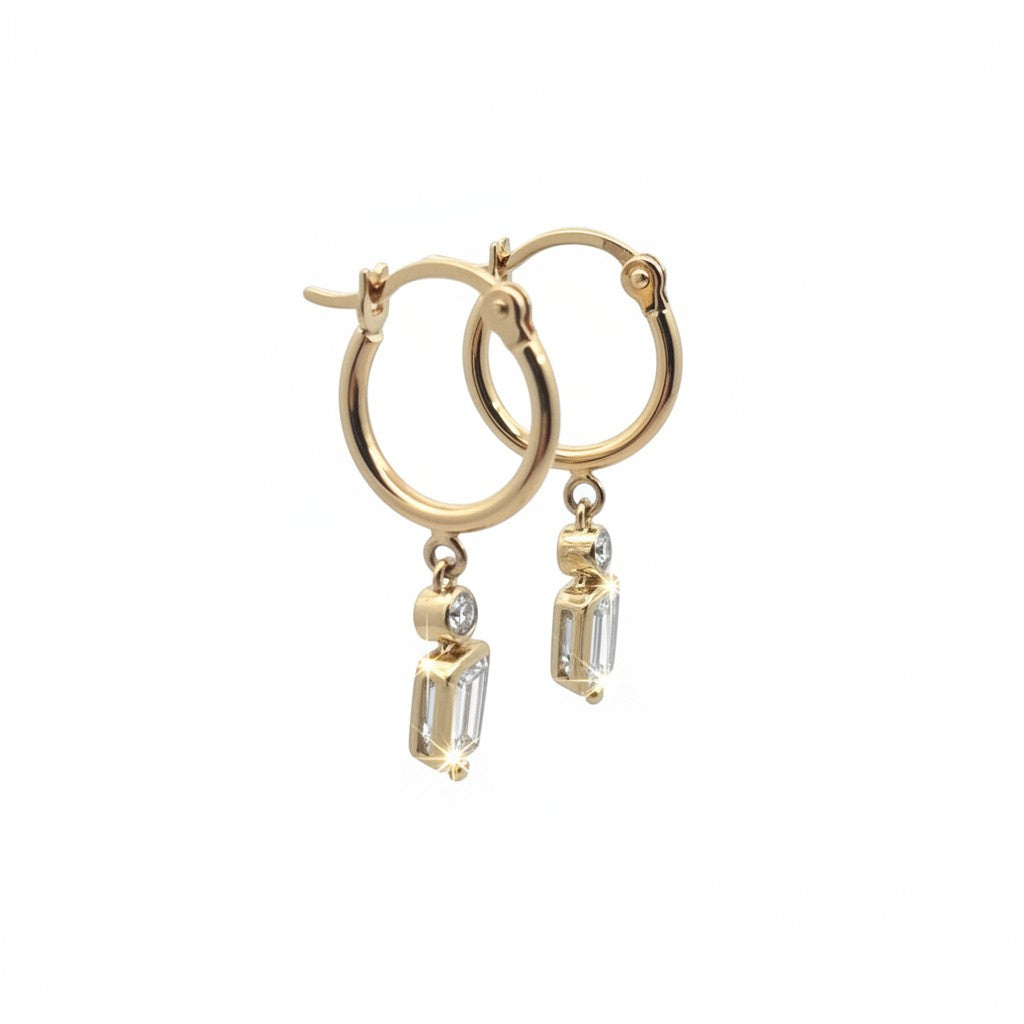 Caribbean Gems 14k yellow gold hoop drop earrings featuring baguette and round cut diamonds on a white background.