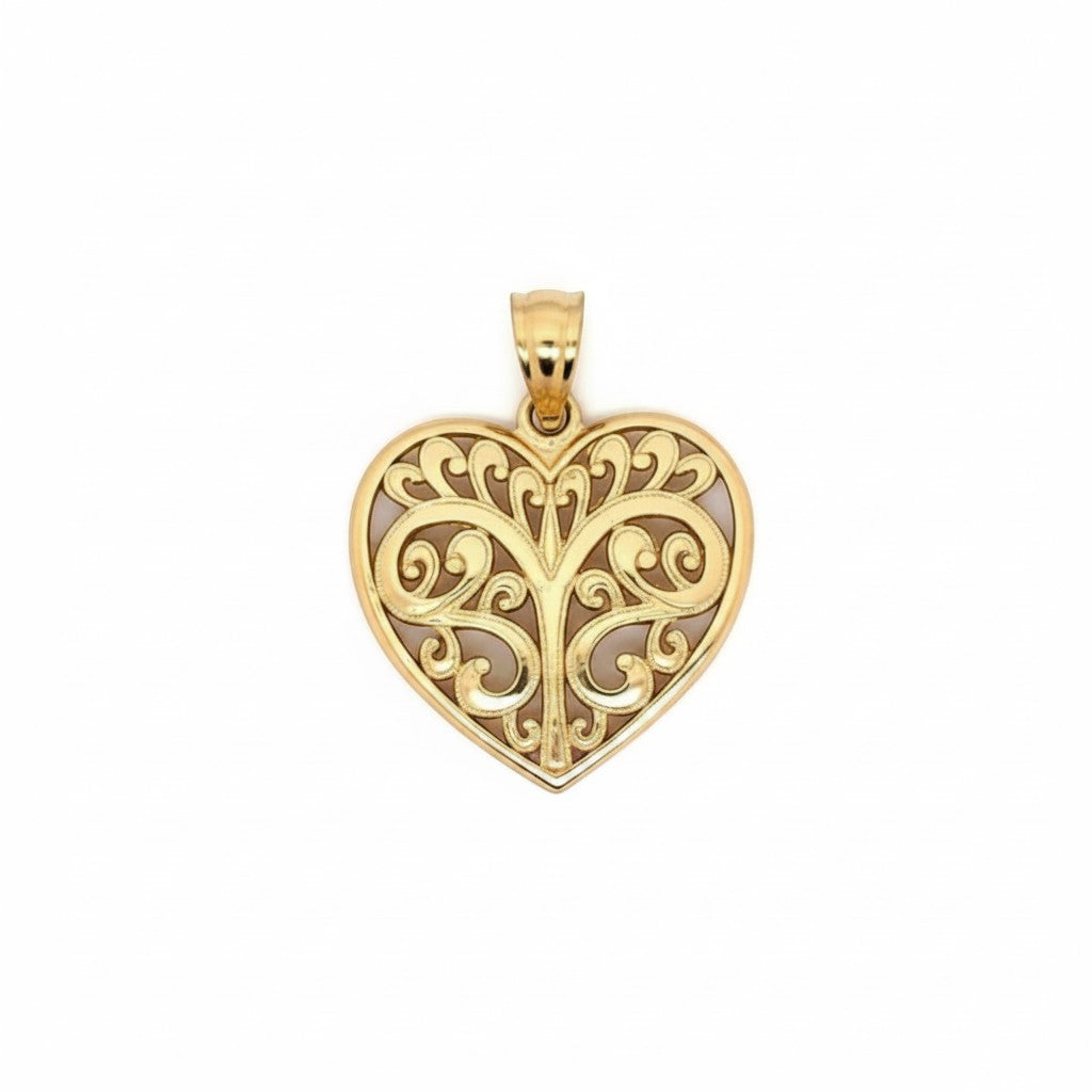 Caribbean Gems 14kt yellow gold heart pendant featuring intricate filigree scrollwork on a white background