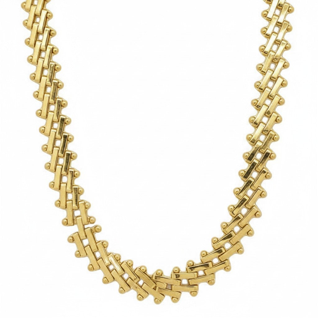 Caribbean Gems elegant gold necklace featuring a sophisticated design with intricate alternating polished links.