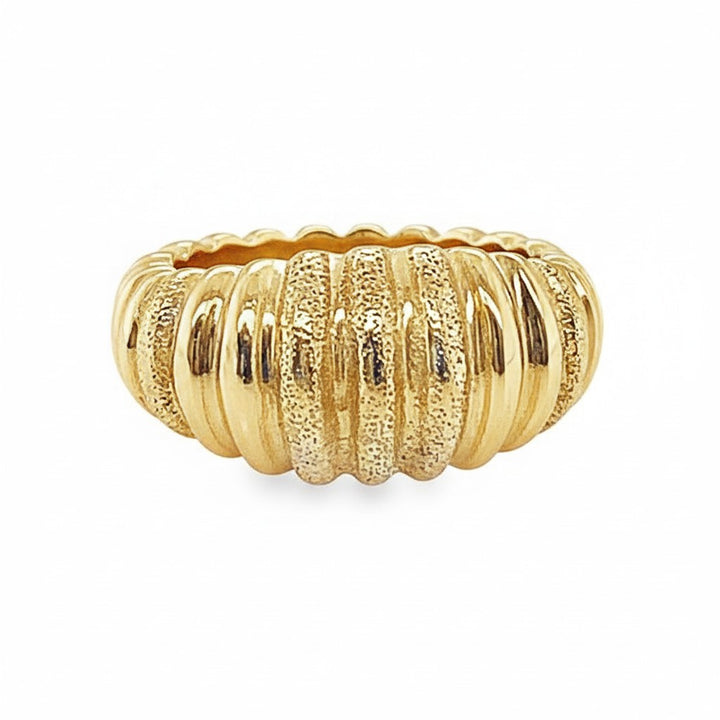 Caribbean Gems elegant gold ring featuring a textured ridged design that reflects light for a sophisticated look.