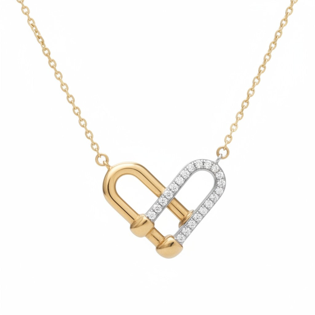 Caribbean Gems heart pendant in 14kt yellow gold with pave-set diamonds on a delicate gold chain