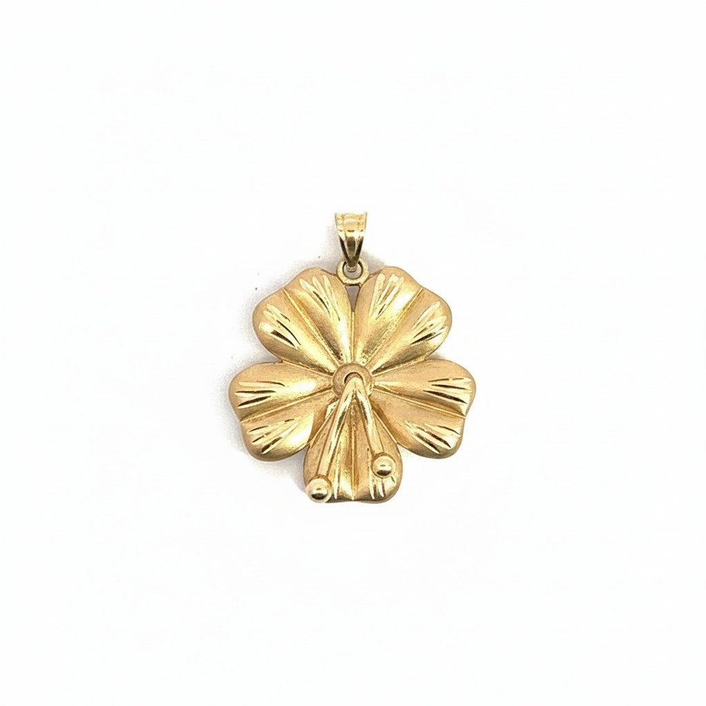 Caribbean Gems 14kt yellow gold hibiscus flower pendant with delicate petal detailing on a white background.