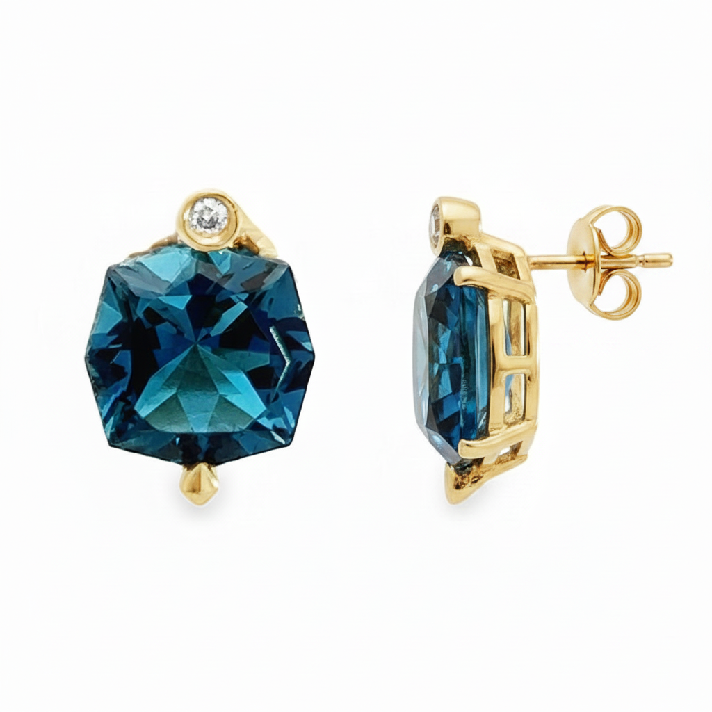 Caribbean Gems London Blue Topaz and diamond stud earrings set in 14kt yellow gold with a faceted hexagonal design.