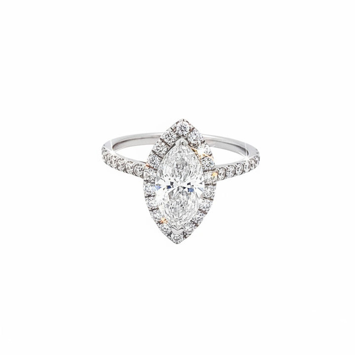 Caribbean Gems marquise diamond engagement ring with a halo setting and pavé-set diamonds on a sleek white gold band.