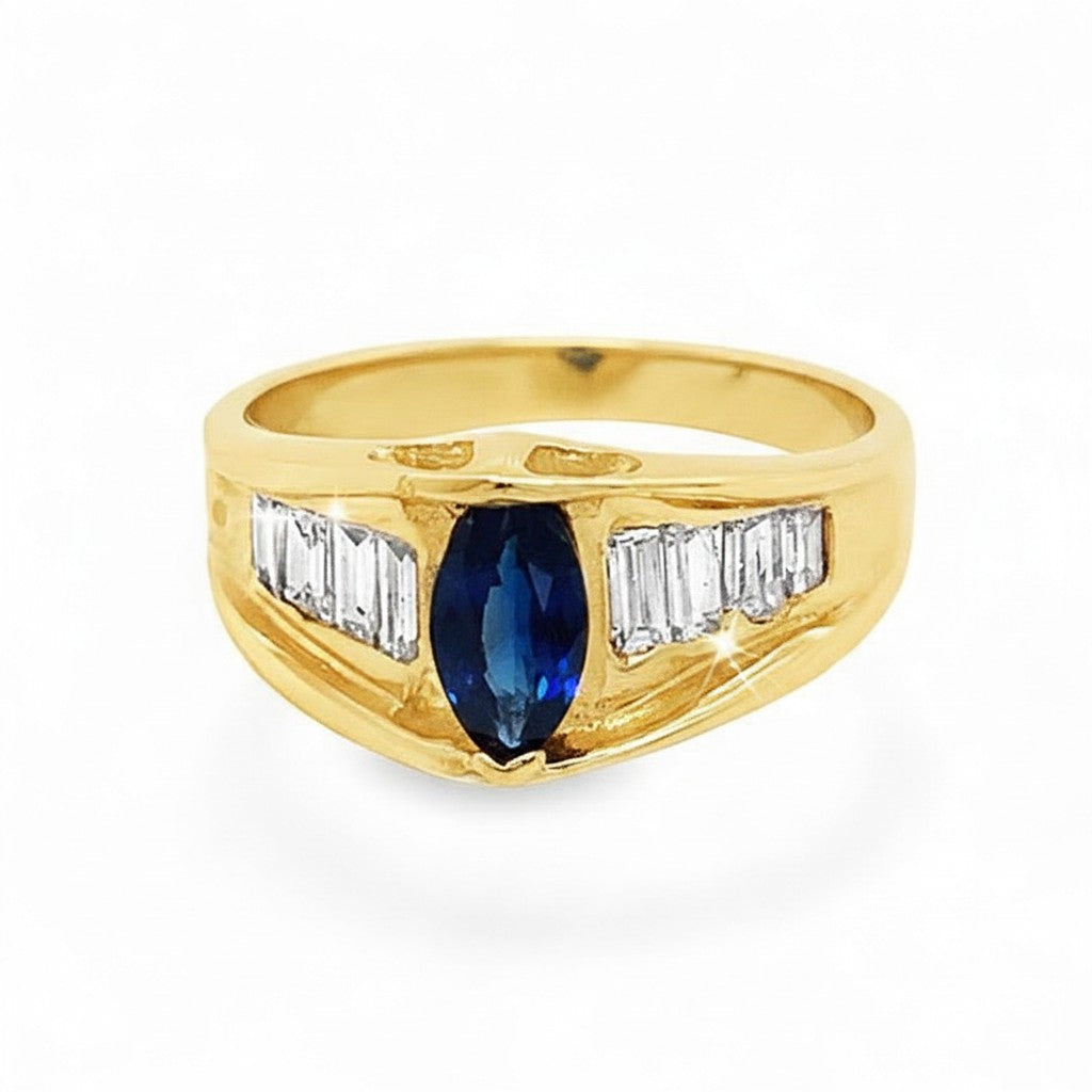 Caribbean Gems 14kt yellow gold ring featuring a 0.73ct marquise sapphire and round diamond accents