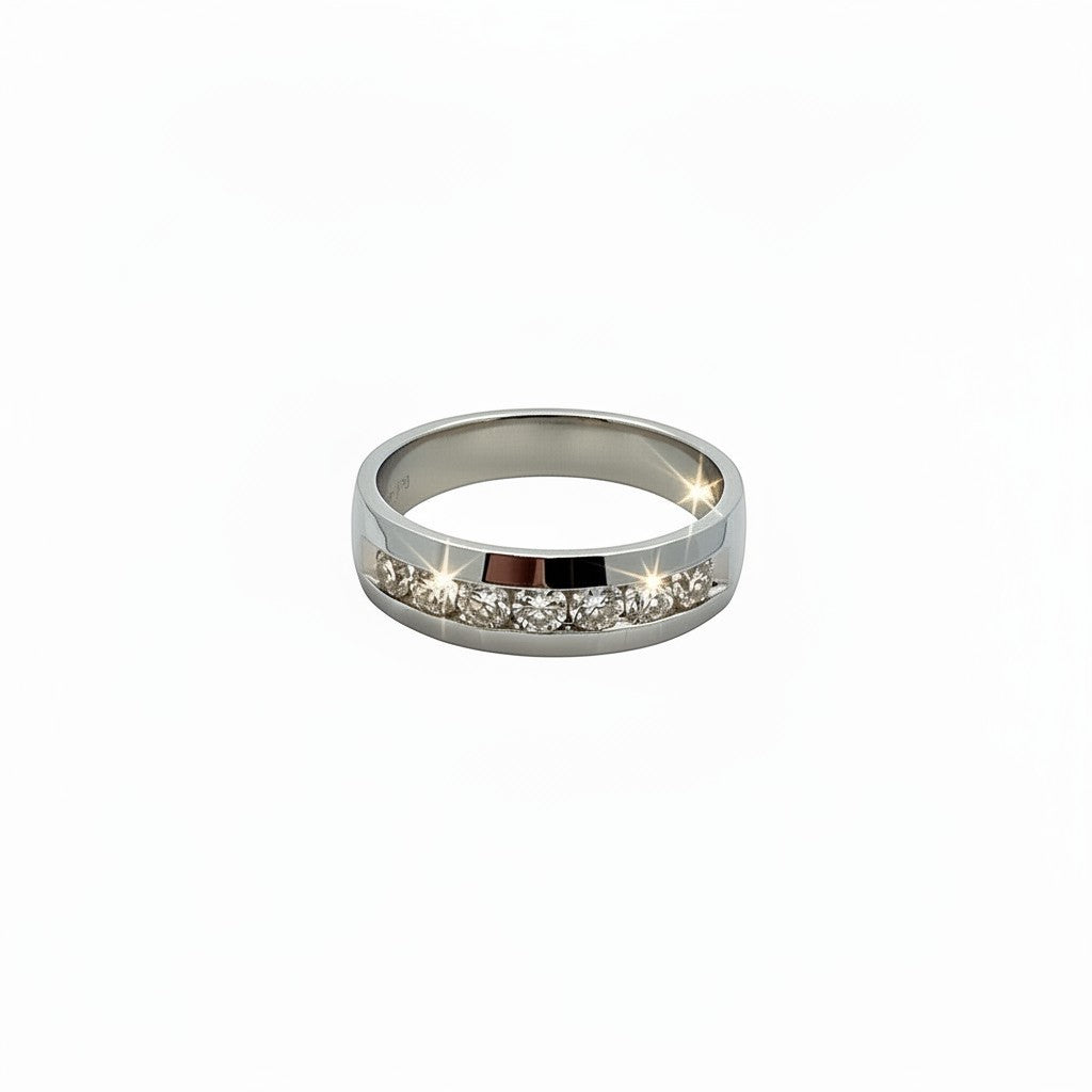 Caribbean Gems men's 14kt white gold band featuring a row of brilliant-cut diamonds in a polished channel setting.